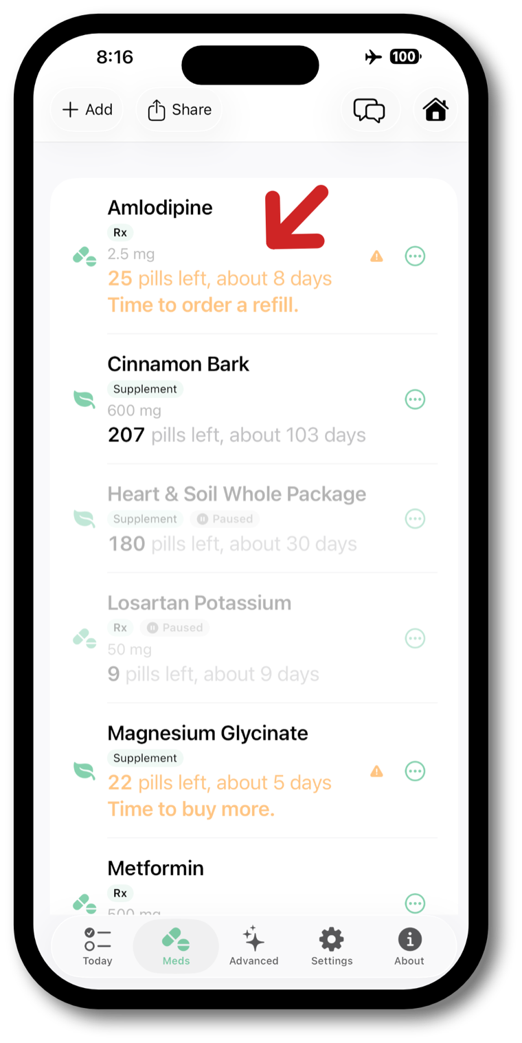 SeymourPills on an iPhone, showing a medication list with pill counts and a refill warning